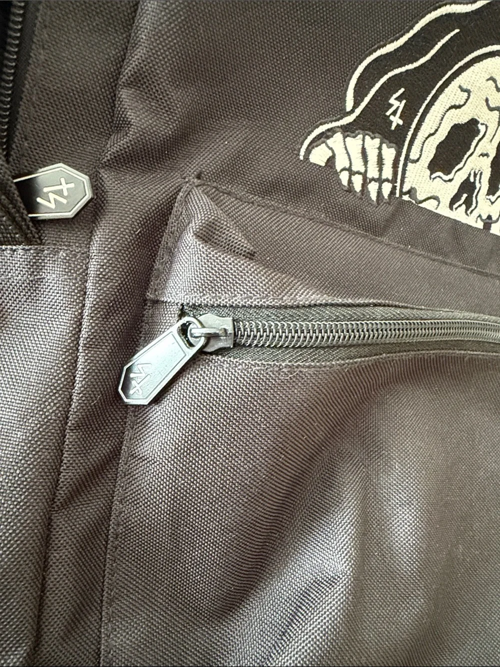 Black Skull Graphic Backpack with Front Pocket